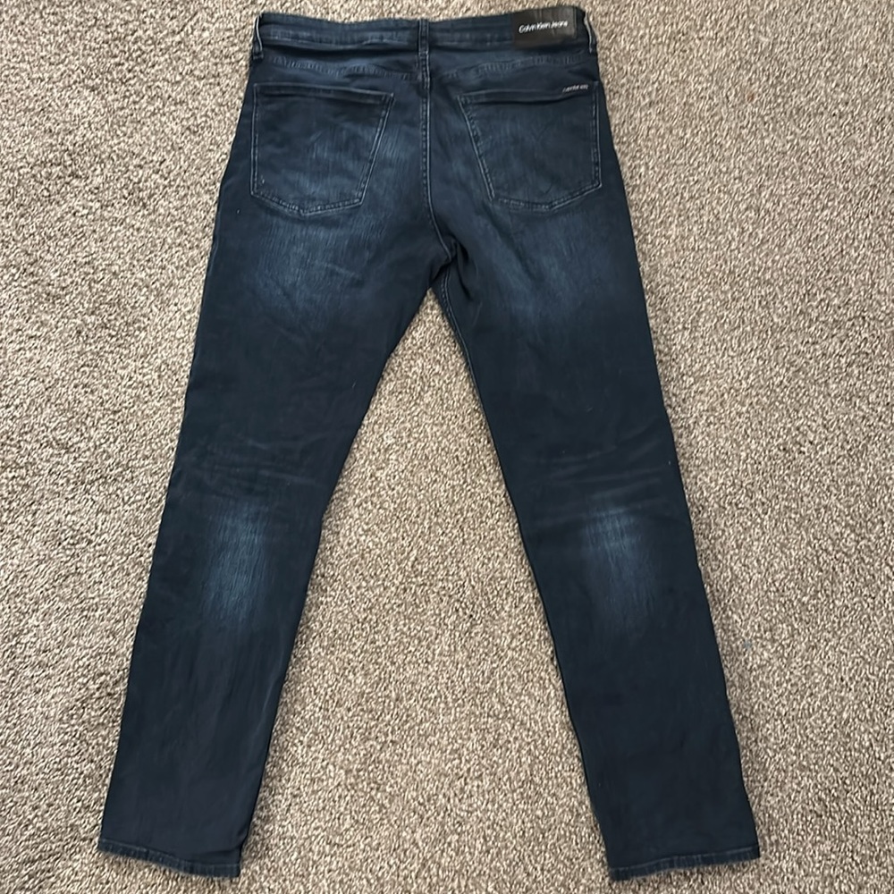 Calvin Klein dark blue jeans
